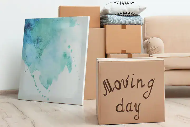 boxes stacked and an artwork next to the boxes