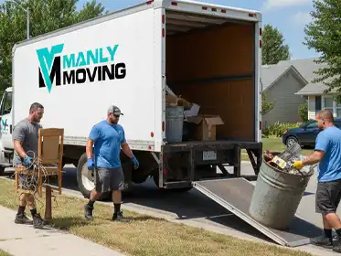Manly Moving crew loading junk into a truck